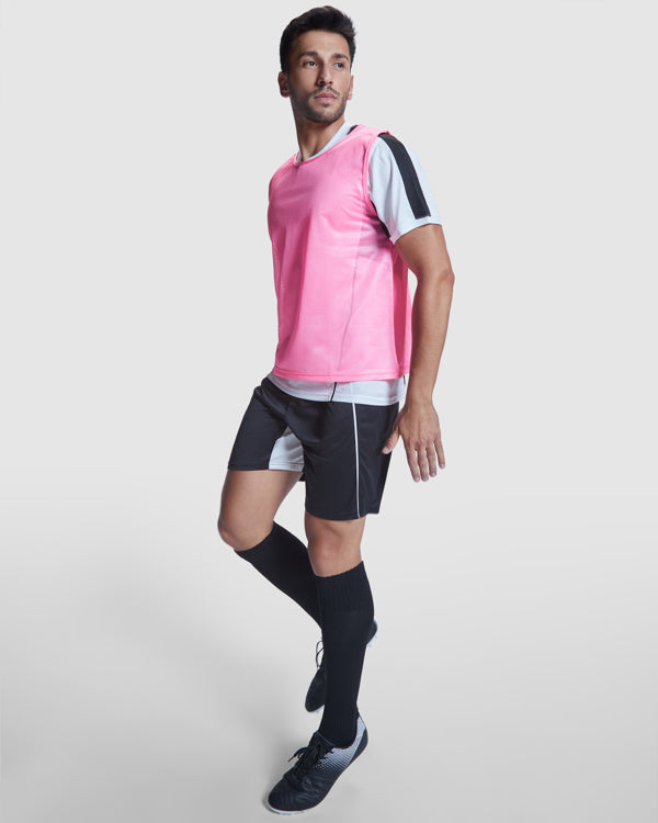 Peto deportivo transpirable unisex.