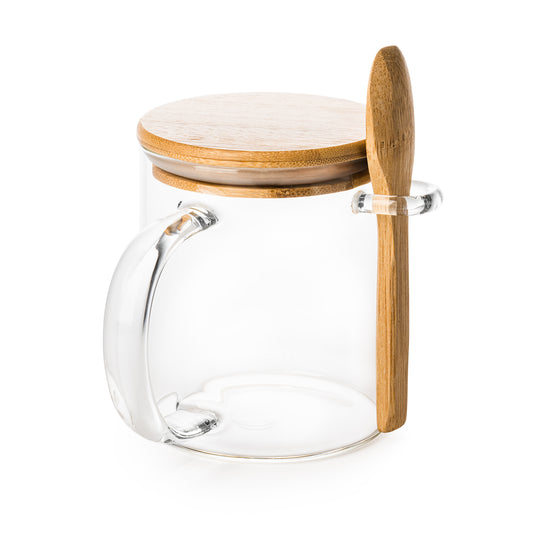 Fantástica taza de cristal borosilicato con tapa y cuchara de bambú a juego. Capacidad de 420 ml.