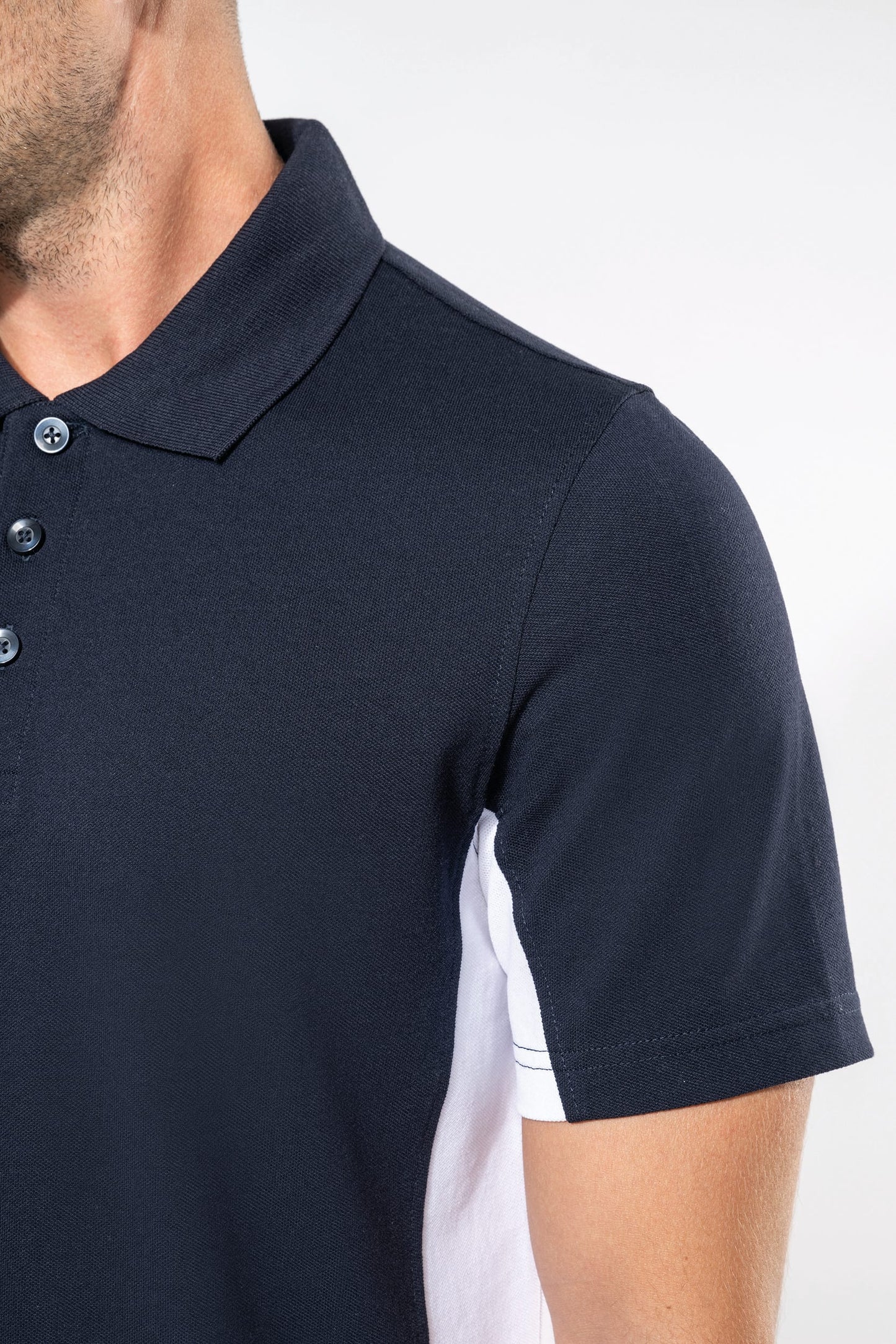 Polo de punto piqué manga corta bicolor hombre Kariban K232