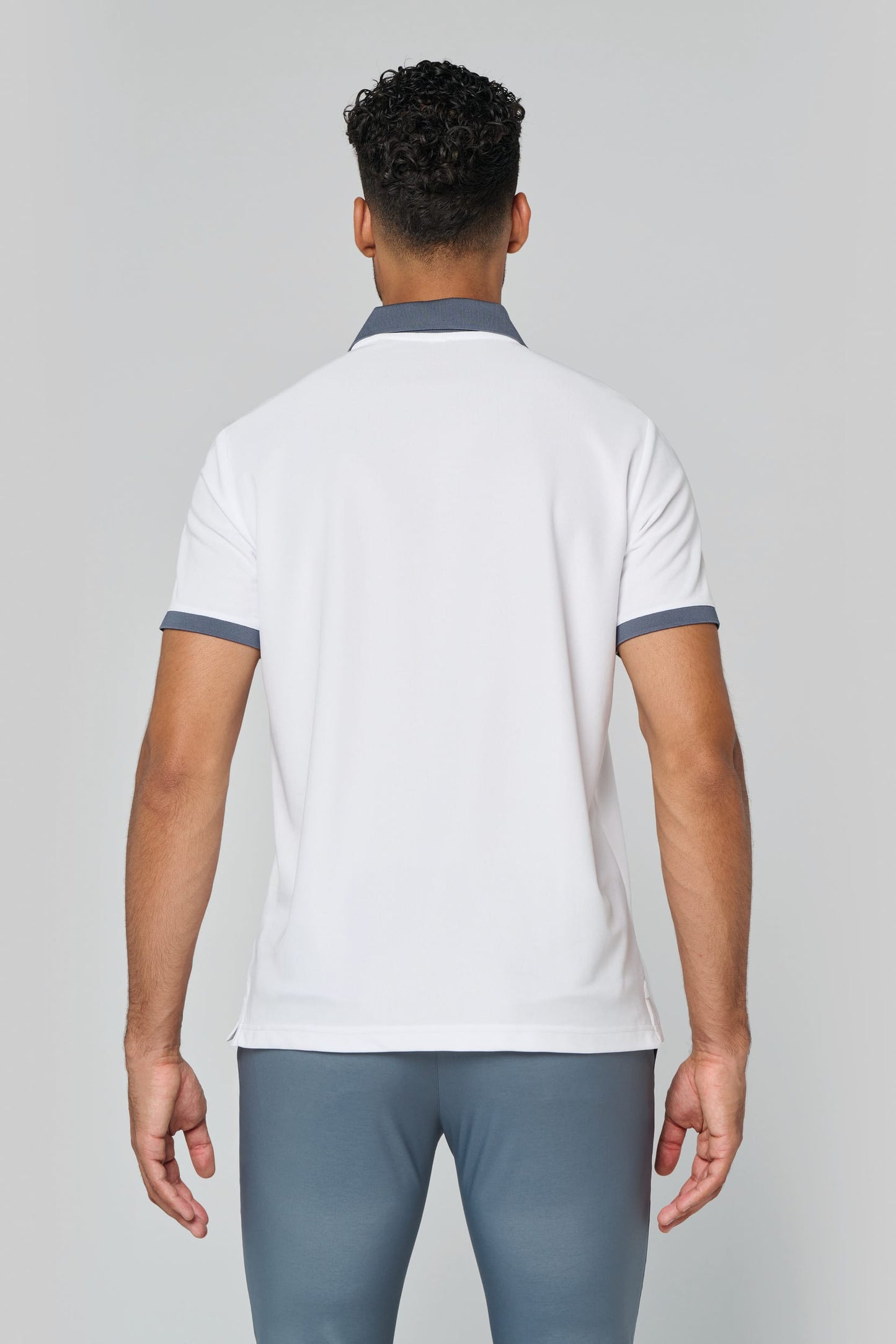 Polo piqué performance hombre PROACT® PA489