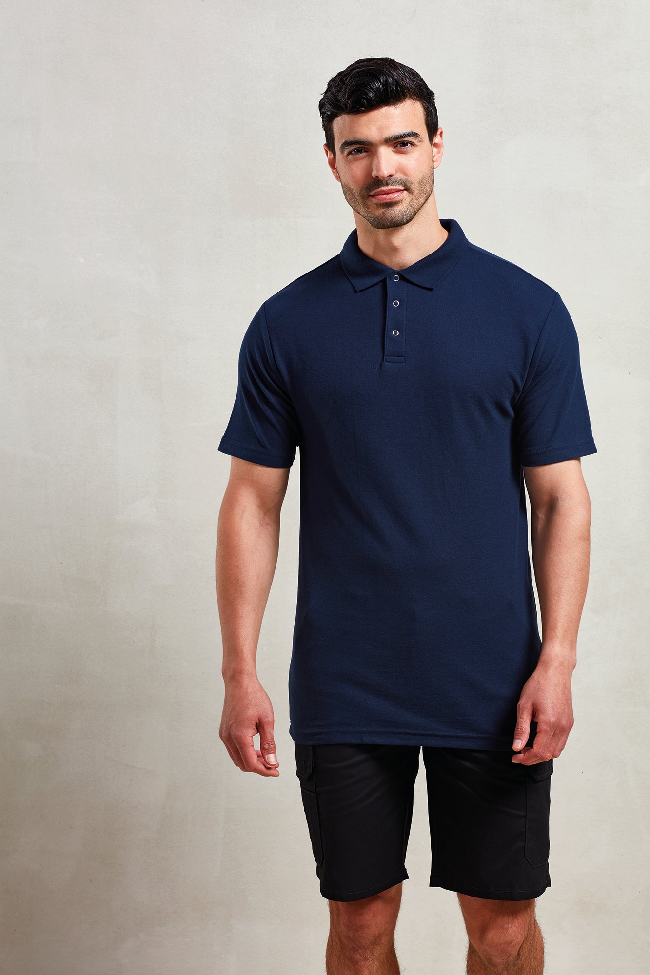 Polo con botón a presión Coolchecker Premier PR612