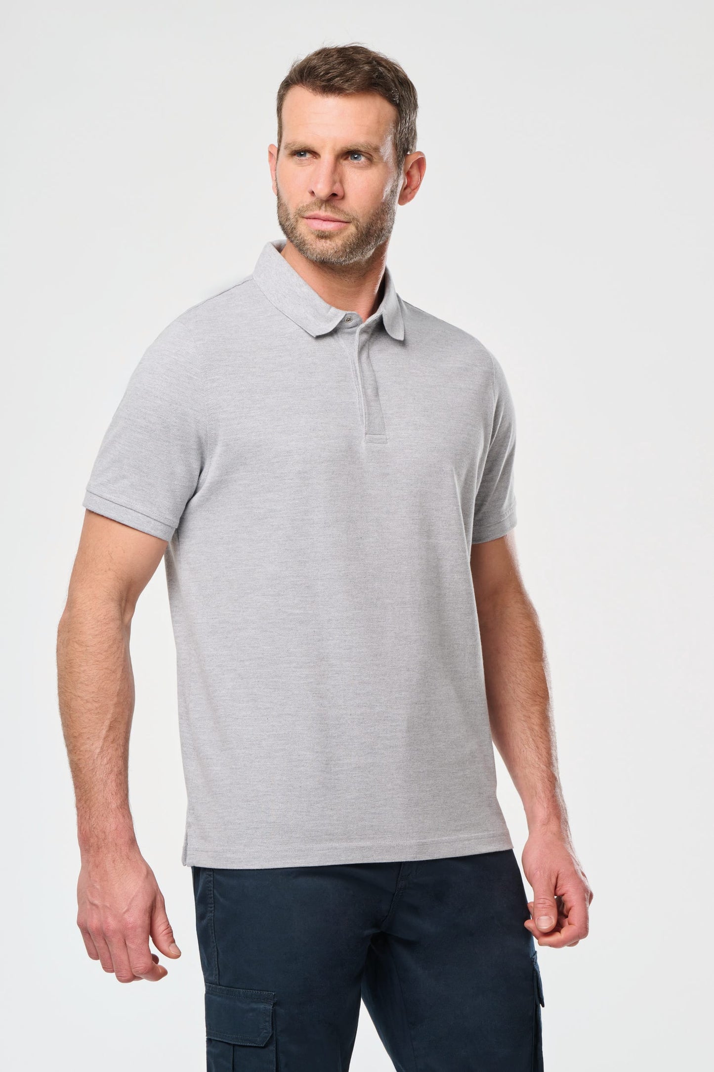Polo con botones a presión y manga corta WK. Designed To Work WK225