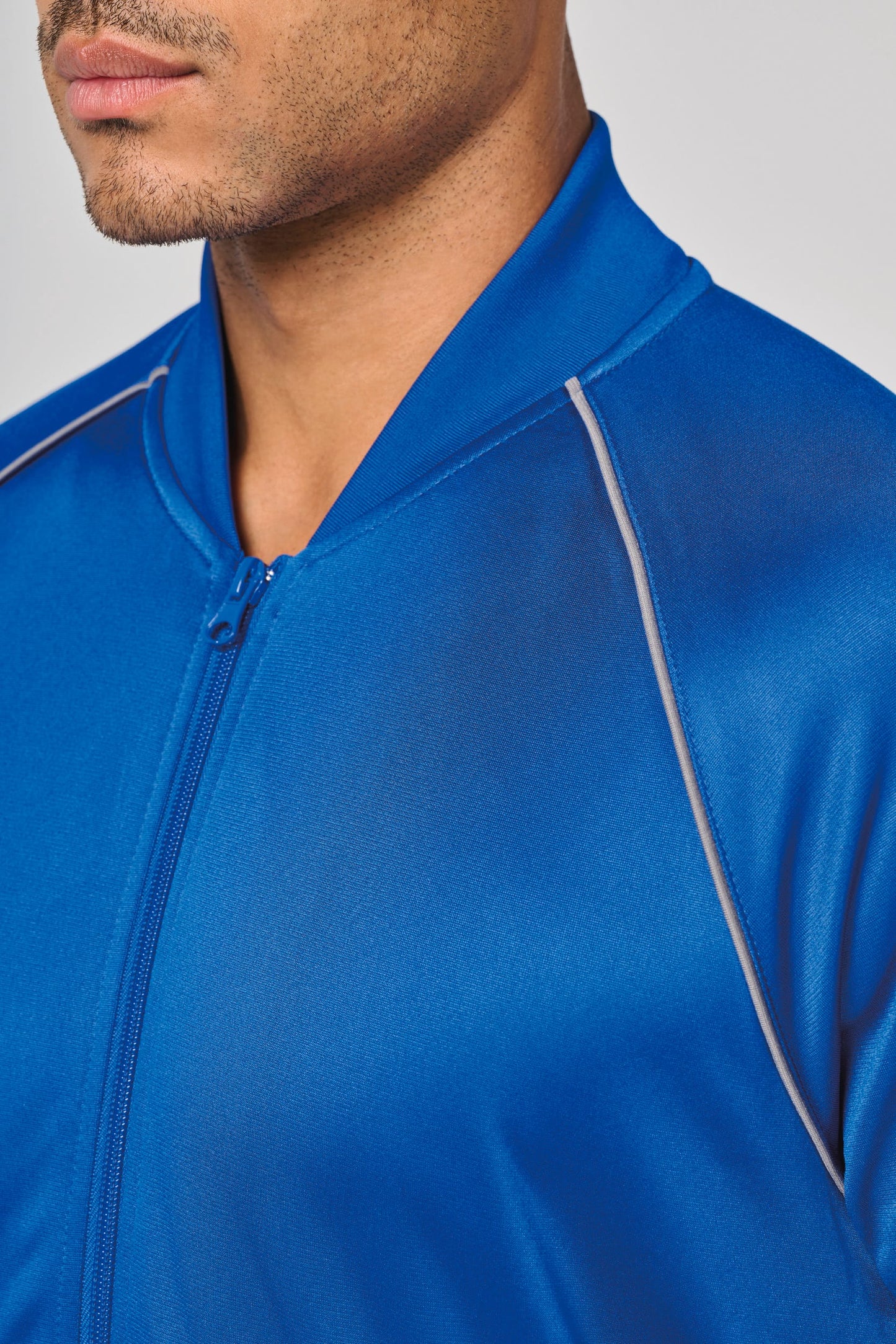 Chaqueta de deporte con cremallera y ribete - Unisex PROACT® PA384